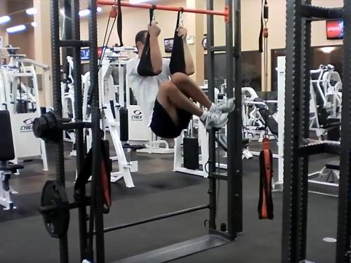 Side Knee Raises Hanging Straps Image